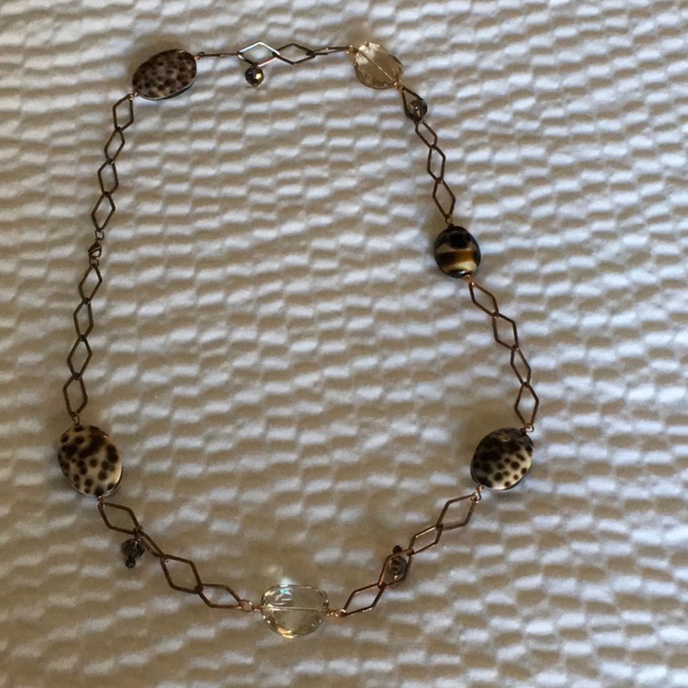 Tortoise shell necklace.